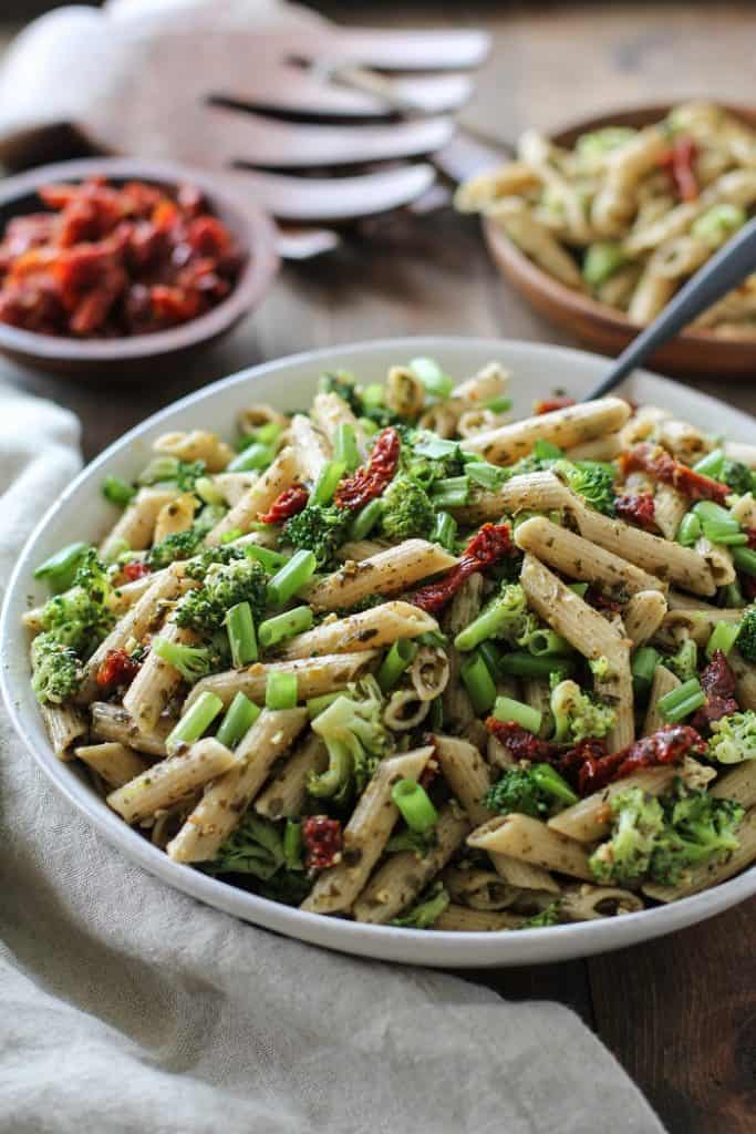 Kale Pesto Pasta Salad with Sun-Dried Tomatoes and Broccoli - a healthy side dish for summer BBQs and picnics | TheRoastedRoot.net #glutenfree