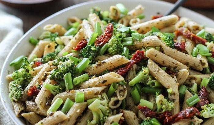 Kale Pesto Pasta Salad with Sun-Dried Tomatoes and Broccoli - a healthy side dish for summer BBQs and picnics | TheRoastedRoot.net #glutenfree