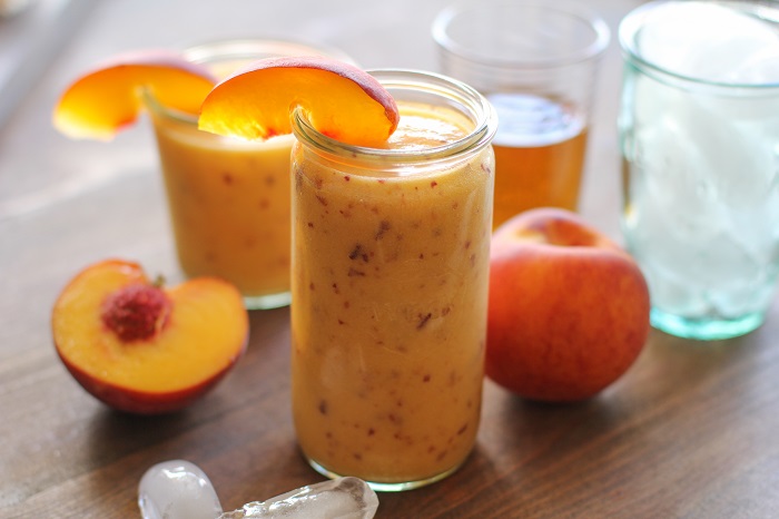 Big Batch Peach Bourbon Slush | TheRoastedRoot.net #cocktail #drink #recipe #booze