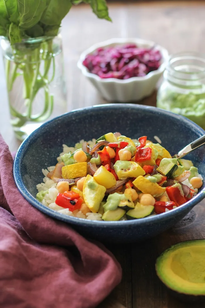 Roasted Summer Vegetable Burrito Bowls with Chickpeas and Avocado-Basil Crema | TheRoastedRoot.net #healthy #recipe #dinner #vegetarian #vegan