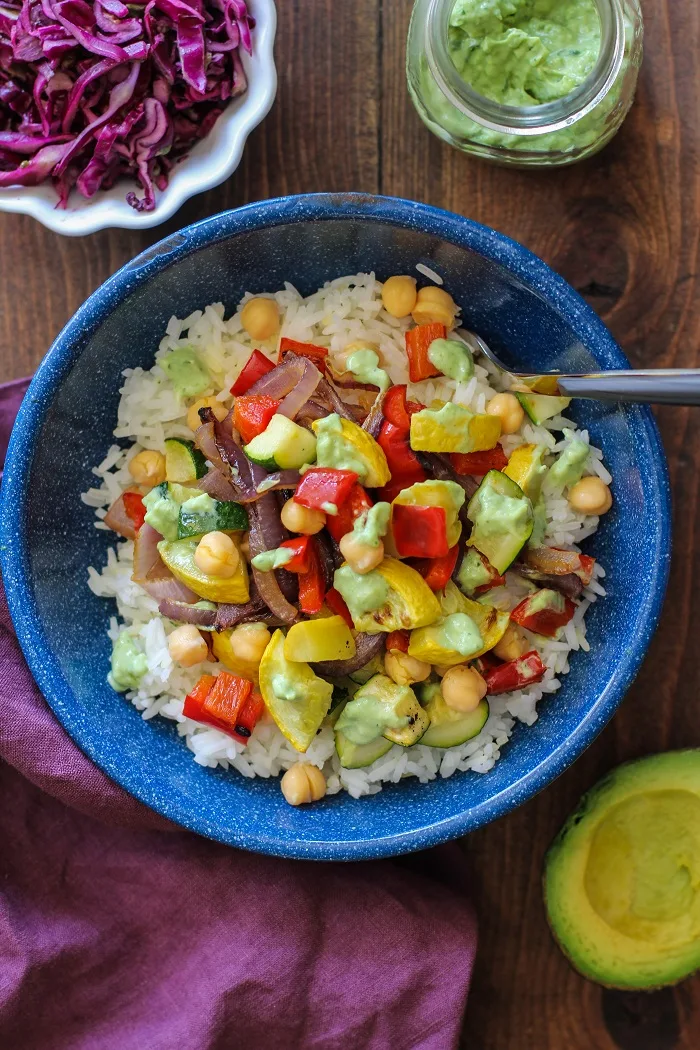Roasted Summer Vegetable Burrito Bowls with Chickpeas and Avocado-Basil Crema | TheRoastedRoot.net #healthy #recipe #dinner #vegetarian #vegan