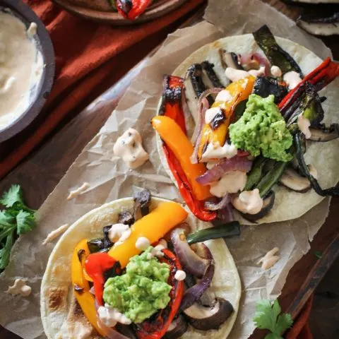 Roasted Portobello Mushroom Fajitas with Chipotle Sour Cream | Theroastedroot.net #healthy #vegetarian #meatlessmonday #glutenfree #dinner