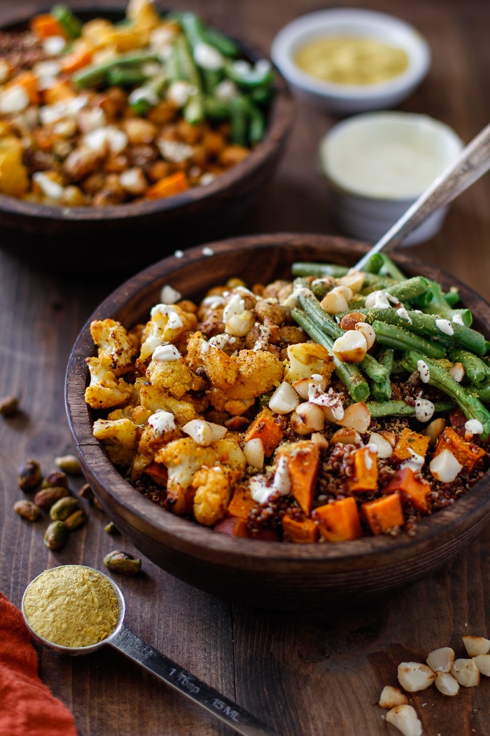 Roasted Vegetable Quinoa Bowls with Toasted Macadamia Nuts and Cashew Cream Sauce | TheRoastedRoot.net #healthy #vegetarian #vegan #glutenfree #recipe #paleo