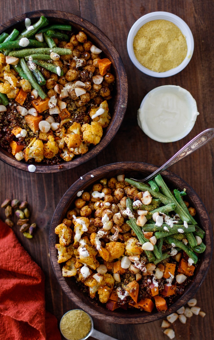 Roasted Vegetable Quinoa Bowls with Toasted Macadamia Nuts and Cashew Cream Sauce | TheRoastedRoot.net #healthy #vegetarian #vegan #glutenfree #recipe #paleo