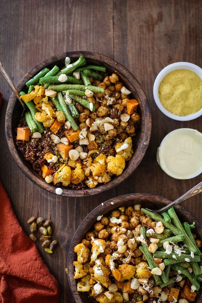 Roasted Vegetable Quinoa Bowls with Toasted Macadamia Nuts and Cashew Cream Sauce | TheRoastedRoot.net #healthy #vegetarian #vegan #glutenfree #recipe #paleo