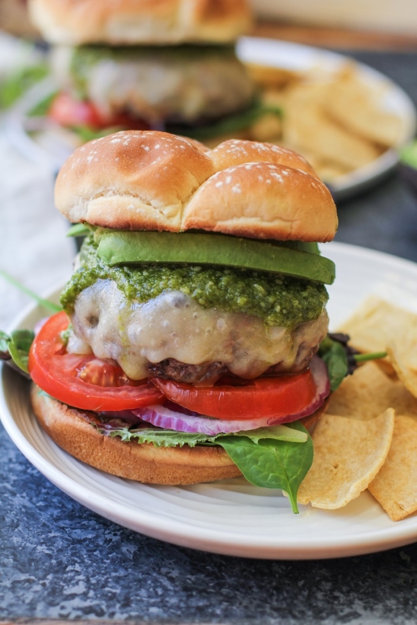 Skillet-Cooked Bison Burgers with Havarti Cheese and Pesto Sauce | TheRoastedRoot.net #recipe #burger #dinner
