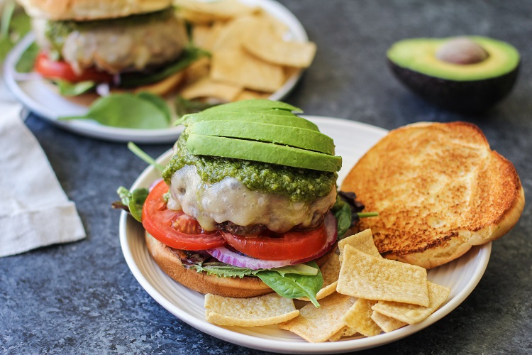 Skillet-Cooked Bison Burgers with Havarti Cheese and Pesto Sauce | TheRoastedRoot.net #recipe #burger #dinner