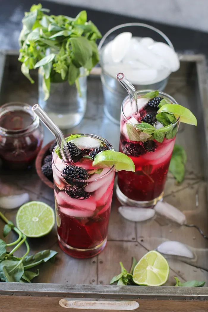 Blackberry Basil Mojitos - clean and naturally sweetened | TheRoastedRoot.net #cocktail #recipe #drink #sugarfree