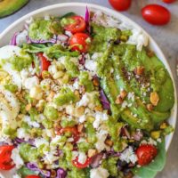 Mexican Street Corn Buddha Bowls with fresh veggies, hard boiled egg, queso fresco, and basil-lime vinaigrette | TheRoastedRoot.net #vegetarian #dinner #recipe #healthy