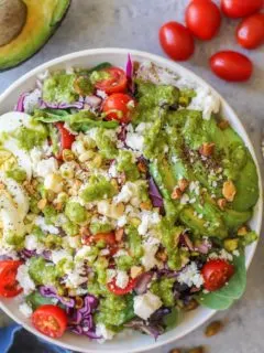Mexican Street Corn Buddha Bowls with fresh veggies, hard boiled egg, queso fresco, and basil-lime vinaigrette | TheRoastedRoot.net #vegetarian #dinner #recipe #healthy
