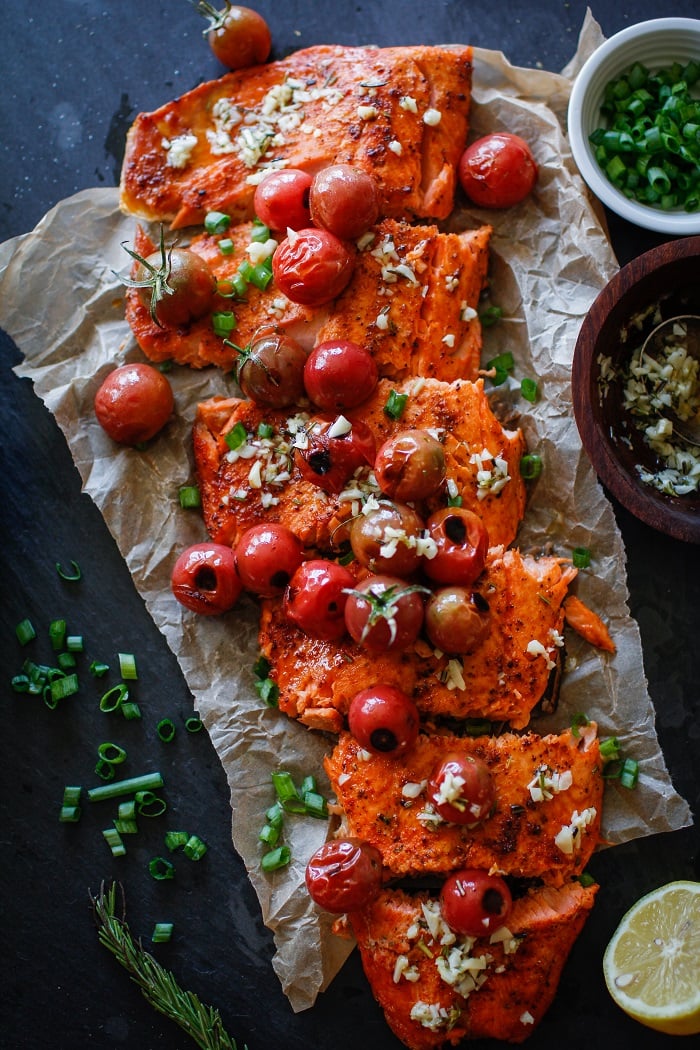 Roasted Salmon with Rosemary Lemon Garlic Butter Sauce and Blistered Tomatoes | TheRoastedRoot.net #healthy #glutenfree #dinner #recipe #copperriversalmon