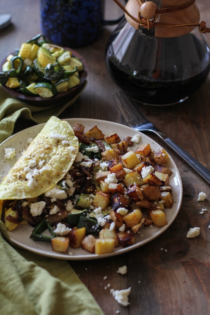 Roasted Vegetable and Caramelized Onion Omelette with Feta | TheRoastedRoot.net #vegetarian #recipe #healthy #breakfast