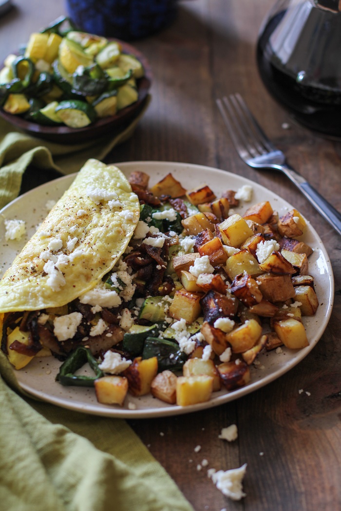 Roasted Vegetable and Caramelized Onion Omelette with Feta | TheRoastedRoot.net #vegetarian #recipe #healthy #breakfast