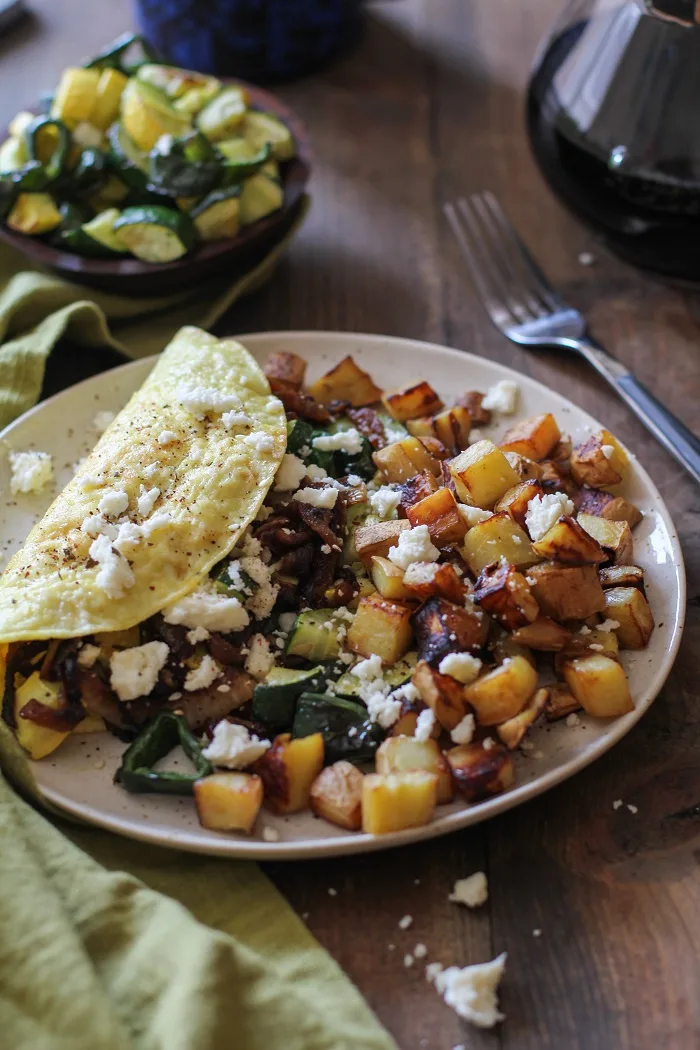 Roasted Vegetable and Caramelized Onion Omelette with Feta | TheRoastedRoot.net #vegetarian #recipe #healthy #breakfast