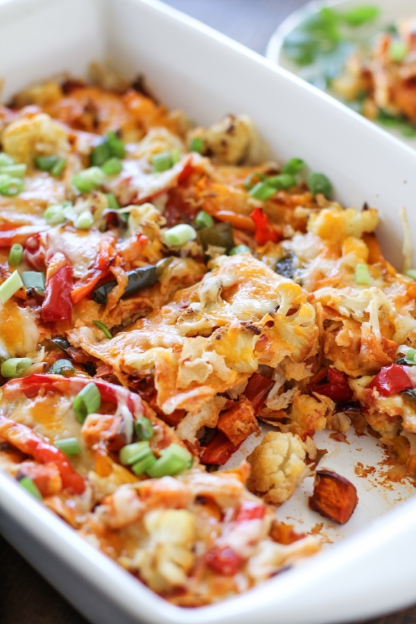 Roasted Vegetable Stacked Enchiladas in a large casserole dish.