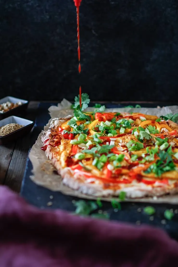 Thai Chicken Pizza with BBQ sauce drizzle