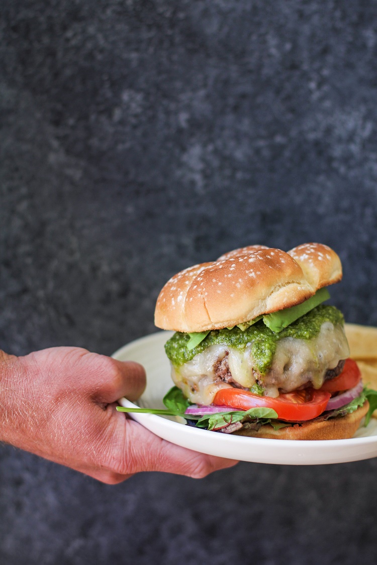 Skillet-Cooked Bison Burgers with Havarti Cheese and Pesto Sauce | TheRoastedRoot.net #recipe #burger #dinner