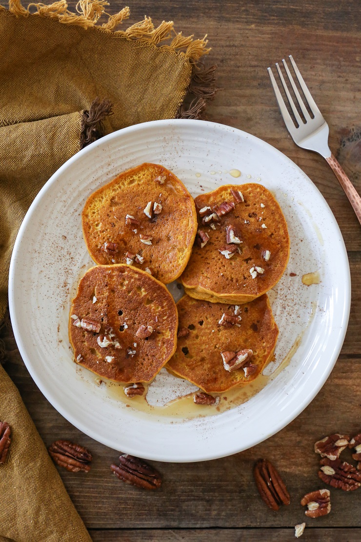 Gluten-Free Pumpkin Pancakes with Cinnamon-Bourbon Syrup | TheRoastedRoot.net #healthy #breakfast #recipe #glutenfree