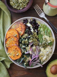 Roasted Sweet Potato and Cauliflower Rice Buddha Bowls with Turmeric Tahini Dressing | TheRoastedRoot.net #healthy #recipe #vegan #vegetarian