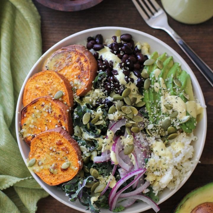 Roasted Sweet Potato and Cauliflower Rice Buddha Bowls with Turmeric Tahini Dressing | TheRoastedRoot.net #healthy #recipe #vegan #vegetarian