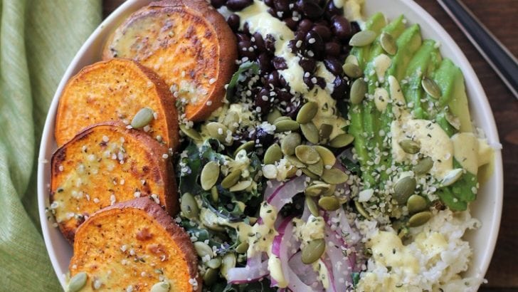 Roasted Sweet Potato and Cauliflower Rice Buddha Bowls with Turmeric Tahini Dressing | TheRoastedRoot.net #healthy #recipe #vegan #vegetarian