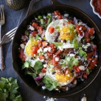 Sweet Potato Huevos Rancheros Nachos with black beans, avocado, sunny side up eggs, salsa, and more | TheRoastedRoot.net #dinner #breakfast #brunch #footballfood #glutenfree #appetizer