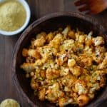 "Cheesy" Vegan Roasted Cauliflower with Nutritional Yeast | TheRoastedRoot.net #healthy #recipe #vegetarian #glutenfree