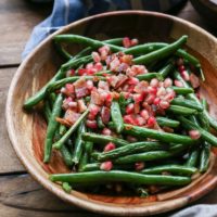 Pan-Fried Bacon Green Beans with Pomegranate Seeds - a healthful, festive side dish perfect for holiday gatherings | TheRoastedRoot.net #glutenfree #vegetables #thanksgiving