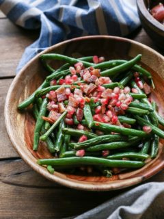 Pan-Fried Bacon Green Beans with Pomegranate Seeds - a healthful, festive side dish perfect for holiday gatherings | TheRoastedRoot.net #glutenfree #vegetables #thanksgiving