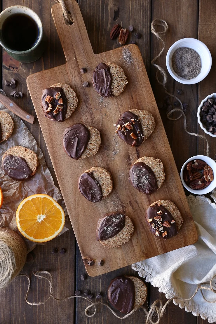 Chocolate Dipped Cardamom Orange Paleo Shortbread Cookies (Vegan) | TheRoastedRoot.net #healthy #dessert #recipe #glutenfree #sugarfree #paleo #holiday #christmascookies