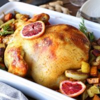 Orange Ginger Turmeric Whole Roast Chicken with Root Vegetables | TheRoastedRoot.net #healthy #recipe #dinner #paleo