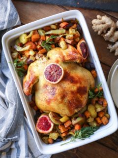 Orange Ginger Turmeric Whole Roast Chicken with Root Vegetables | TheRoastedRoot.net #healthy #recipe #dinner #paleo