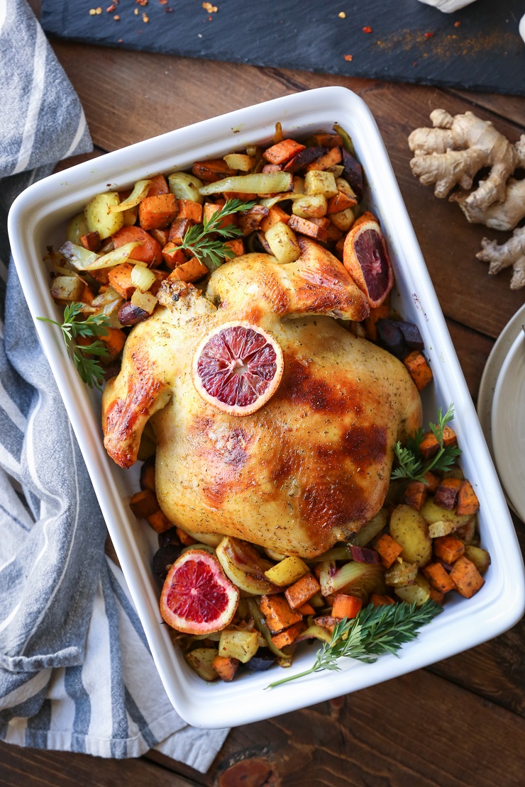 Orange Ginger Turmeric Whole Roast Chicken with Root Vegetables | TheRoastedRoot.net #healthy #recipe #dinner #paleo