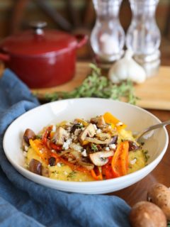 Creamy Polenta with Caramelized Onions, Peppers, and Mushrooms | TheRoastedRoot.net #vegetarian #glutenfree #dinner