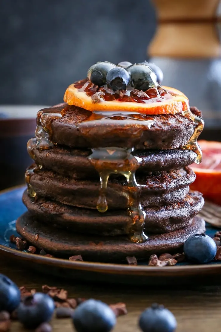 Chocolate Buckwheat Pancakes - gluten-free, packed with protein! | TheRoastedRoot.net #breakfast #glutenfree #pancakes