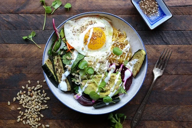 Prebiotic and Probiotic Macro Bowls - spaghetti squash, beets, greens, avocado, roasted vegetables, sauerkraut, and kefir makes for a healthy well-balanced meal. | TheRoastedRoot.net #healthy #dinner #recipe #glutenfree 