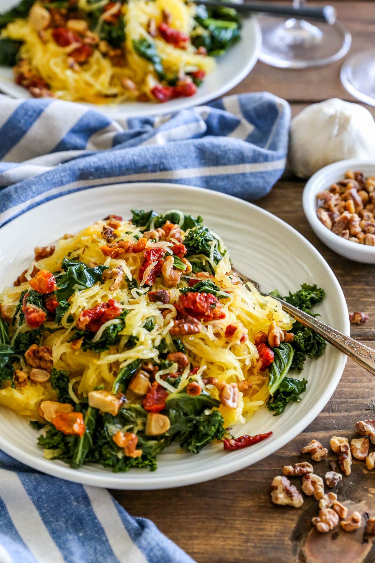 Roasted Garlic and Kale Spaghetti Squash with Sun-Dried Tomatoes - a healthy low-carb vegetarian meal | TheRoastedRoot.net #dinner #recipe #vegan
