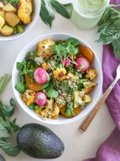 Roasted Spring Vegetable Buddha Bowls with Avocado Green Goddess Dressing | TheRoastedRoot.net #healthy #dinner #recipe #vegan #vegetarian