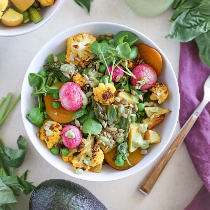 Roasted Spring Vegetable Buddha Bowls with Avocado Green Goddess Dressing | TheRoastedRoot.net #healthy #dinner #recipe #vegan #vegetarian