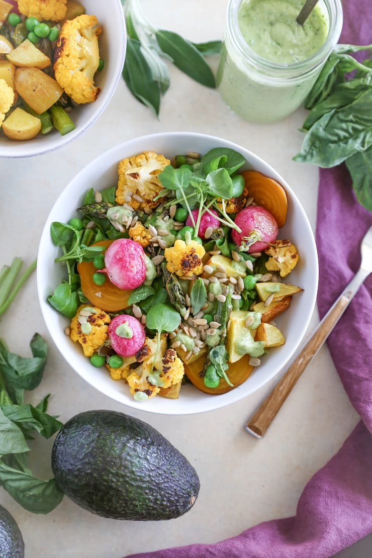 Roasted Spring Vegetable Buddha Bowls with Avocado Green Goddess Dressing | TheRoastedRoot.net #healthy #dinner #recipe #vegan #vegetarian 