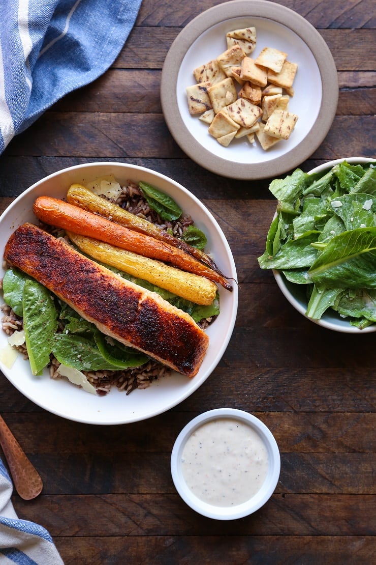 Baked Salmon Caesar Salad Bowls with roasted carrots and wild rice | TheRoastedRoot.net #healthy #dinner #recipe