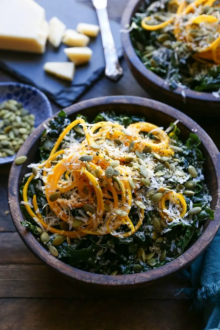 Spiralized Golden Beet and Kale Salad with parmesan, pumpkin seeds, and hemp seeds. A healthy vegetarian side dish or entree.