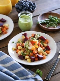 Paleo Eggs Benedict with Avocado Hollandaise with roasted root vegetables - a cleaner take on the classic brunch recipe