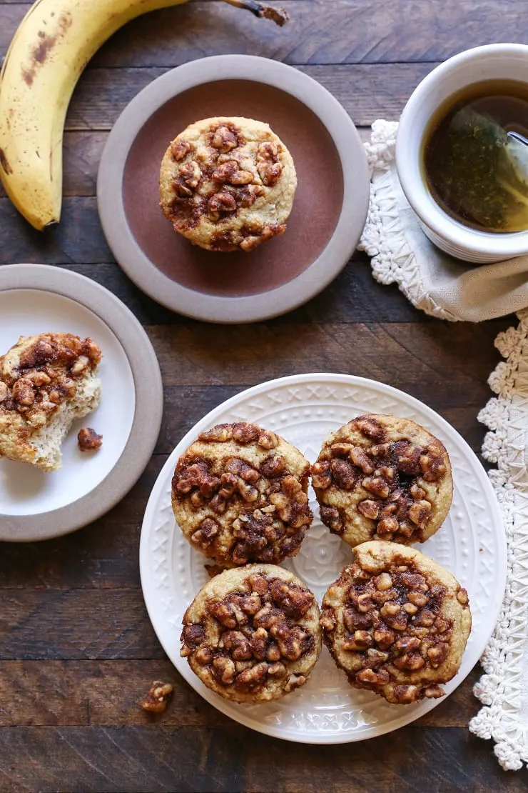 Grain-Free Paleo Banana Walnut Muffins with walnut topping. Made with almond flour and pure maple syrup for a healthy treat.