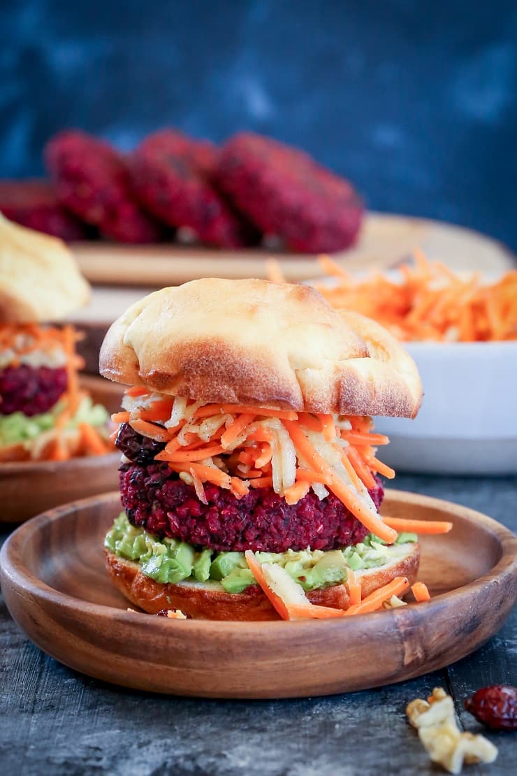 Beet and Black Bean Burgers with Carrot Slaw - a nutritious, filling vegan dinner recipe that only takes 30 minutes to make!