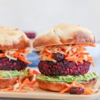 Beet and Black Bean Burgers with Carrot Slaw - a nutritious, filling vegan dinner recipe that only takes 30 minutes to make!