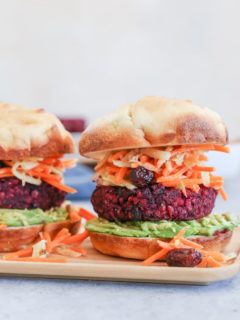 Beet and Black Bean Burgers with Carrot Slaw - a nutritious, filling vegan dinner recipe that only takes 30 minutes to make!