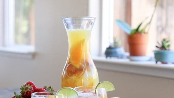Tropical White Sangria - a naturally sweetened, cocktail recipe. So crisp, refreshing, and perfect for summer gatherings!