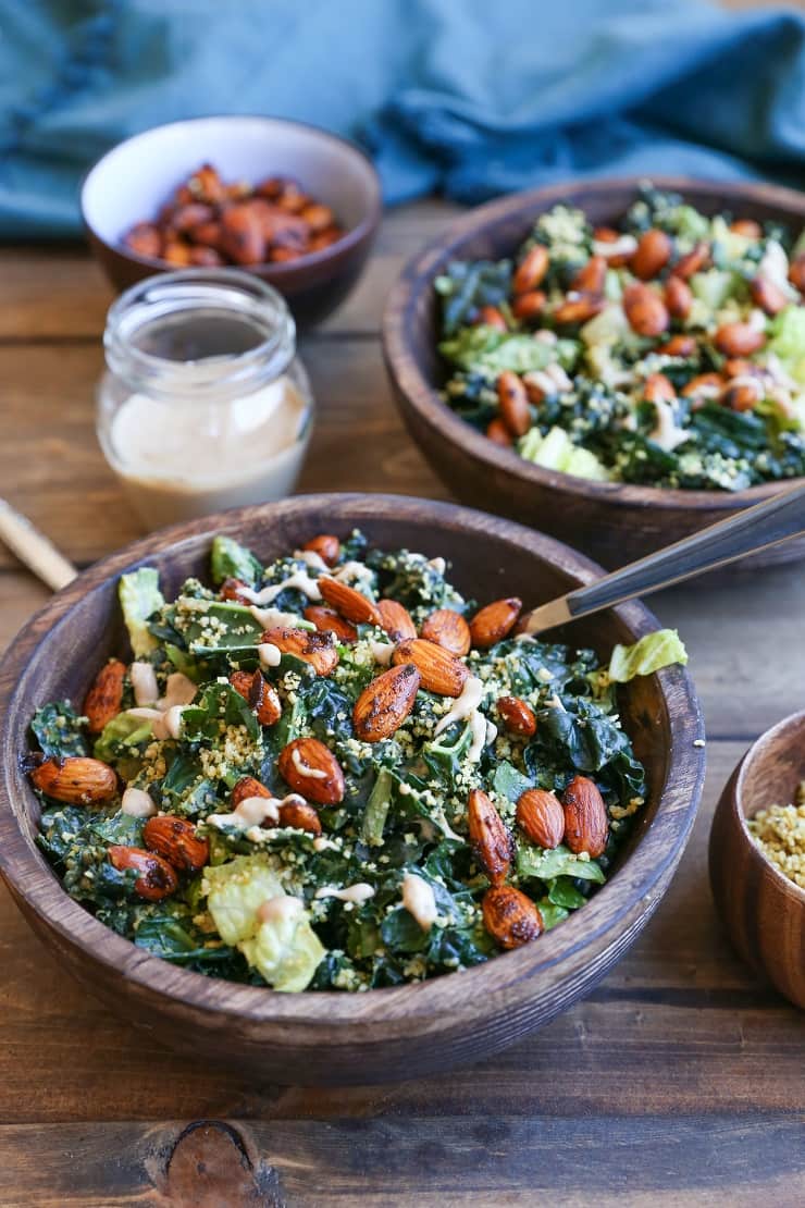 The Best Vegan Kale Caesar Salad Recipe - made with all whole food ingredients. This paleo caesar salad is perfect for gatherings!