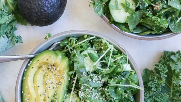 Vegan and Paleo Raw Power Bowls with broccoli, kale, spinach, cucumber, avocado, and more!